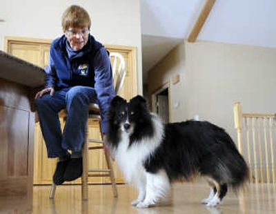 
Debbie Jensen's Shetland sheepdog Tavi broke a side tooth while munching on a treat. Jensen's dentist, Dr. Kenneth M. Collins, performed  a root canal  on the dog. 
 (Dan Pelle / The Spokesman-Review)