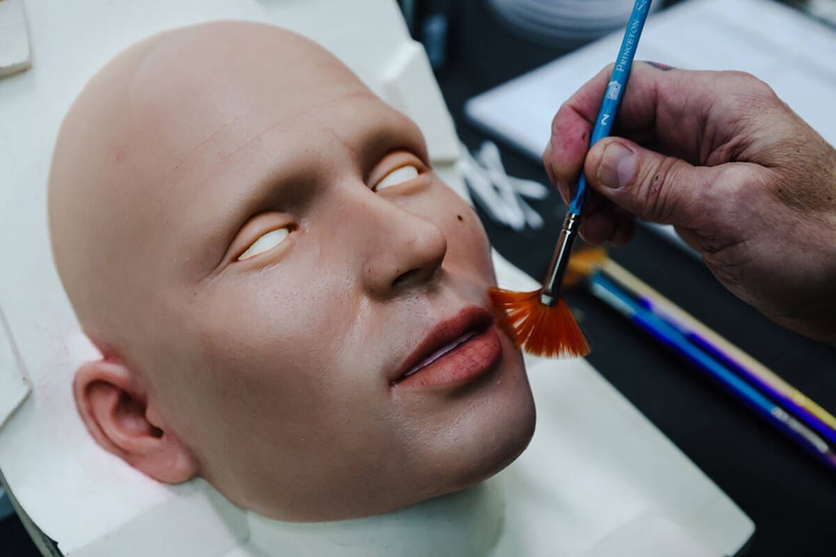 Founder Matt McMullen works on the face of a robot at the workshop for Realbotix, a company that makes life-like AI driven robots, in Las Vegas, on Jan. 17.  (Rachel Aston/Las Vegas Review-Journal)