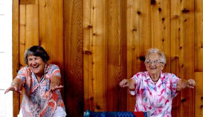 
Gladys Visnes, left, and Harriet Marek,  both from Coeur d'Alene, participate in the Fit and Fall Proof program at First Christian Church.
 (Kathy Plonka / The Spokesman-Review)