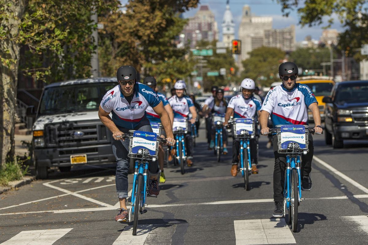 Pro linebacker Connor Barwin takes a spin with local fans to celebrate Capital Ones new sponsorship of Indego, the bike share program in Philadelphia. Spokane is considering bringing bike share to town. (Al Tielemans / AP Images for Capital One)