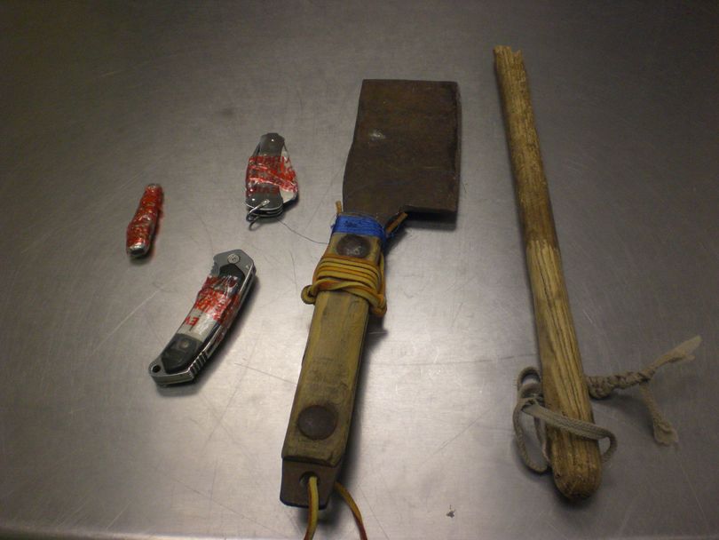 These weapons were seized from a man who police say was saving them at Patty Murray supporters. (Spokane Police Department)