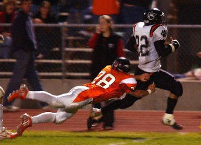 
West Valley's Phillip Gannon holds onto Lewis and Clark's Ethan Robinson during the Eagles Sept. 16 homecoming game.
 (Liz Kishimoto / The Spokesman-Review)