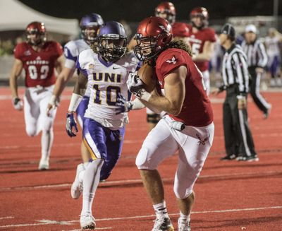 Eastern Washington’s Beau Byus hauls in the winning touchdown catch against Northern Iowa’s Daurice Fountain in the final seconds on Sept. 17, 2016, in Cheney, Wash. (Dan Pelle / The Spokesman-Review)
