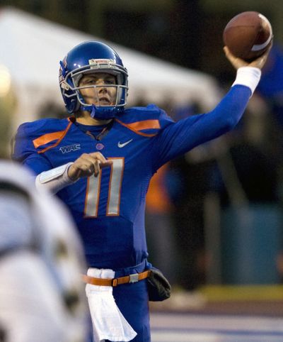 Boise State’s Kellen Moore throws a pass against UC Davis during the first half of the Broncos’ 34-16 win. (Associated Press / The Spokesman-Review)