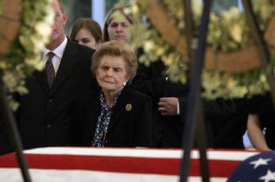 
Former first lady Betty Ford is surrounded by family Friday near the casket of her husband in Palm Desert, Calif. Gerald R. Ford died Tuesday. He will be buried in Grand Rapids, Mich.
 (Associated Press / The Spokesman-Review)