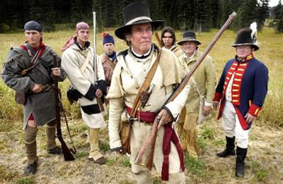 
Bud Clark, center, portrays his famous ancestor William Clark on a reenactment tour of the Lewis and Clark expedition.
 (Jesse Tinsley / The Spokesman-Review)