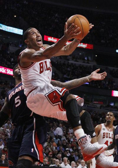 Bulls’ Derrick Rose scored 18 of his 34 points in the third quarter. (Associated Press)
