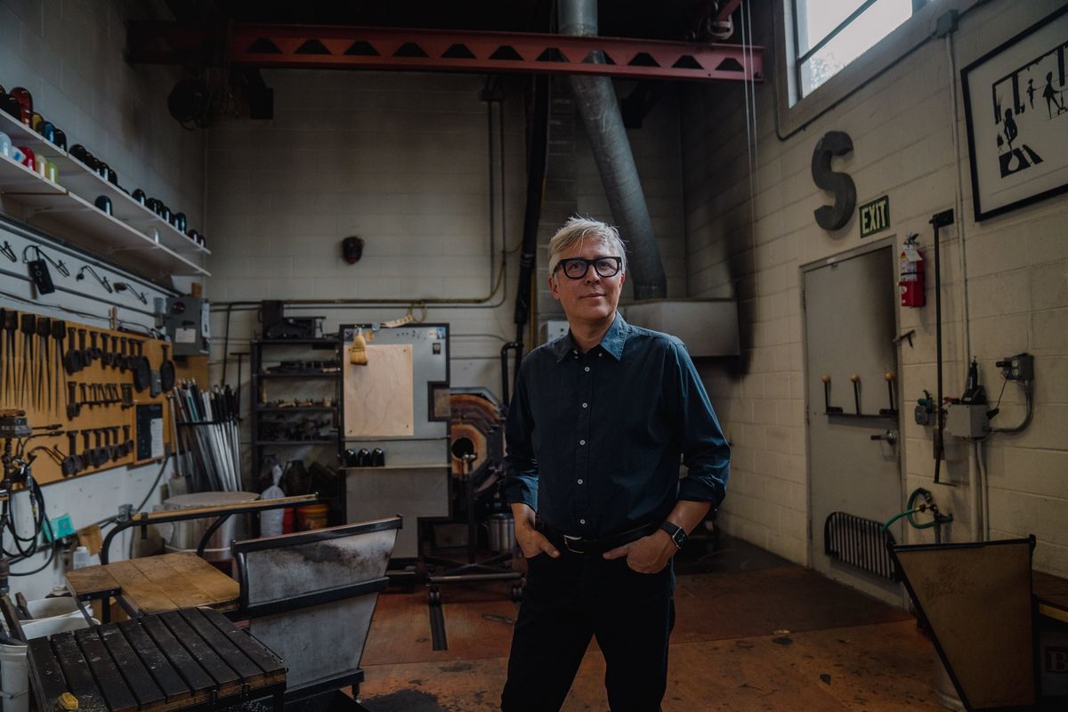 Preston Singletary at his studio on March 30, 2022, in Seattle. His “Raven and the Box of Daylight” will be at the Northwest Museum of Arts and Culture starting Thursday. (Jovelle Tamayo/For American Craft)