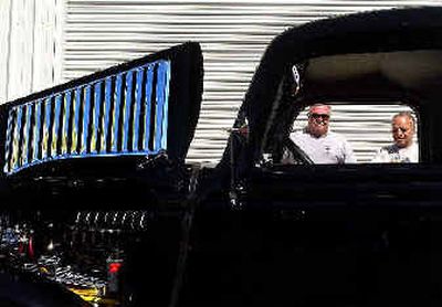 
Harry Whitman, left, stands in Post Falls near his 1936 Ford pickup truck, which was restored by his friend Don Swartz.
 (Brian Plonka / The Spokesman-Review)