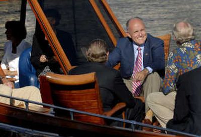 
Rudy Giuliani takes a boat trip from The Coeur d'Alene Resort to the home of attorney John Magnuson for  a campaign fundraiser Thursday. 
 (Kathy Plonka / The Spokesman-Review)