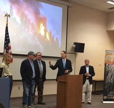 Oregon Sen. Ron Wyden speaks at the National Interagency Fire Center in Boise on Wednesday, May 2, 2018; from left are Acting U.S. Forest Service Chief Vicki Christiansen, Idaho Rep. Mike Simpson, Idaho Sen. Mike Crapo, and at right, Idaho Sen. Jim Risch.