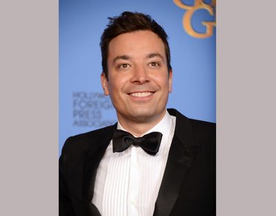In this Jan. 12, 2014, file photo, Jimmy Fallon poses in the press room at the 71st annual Golden Globe Awards in Beverly Hills, Calif. (Jordan Strauss / Associated Press)