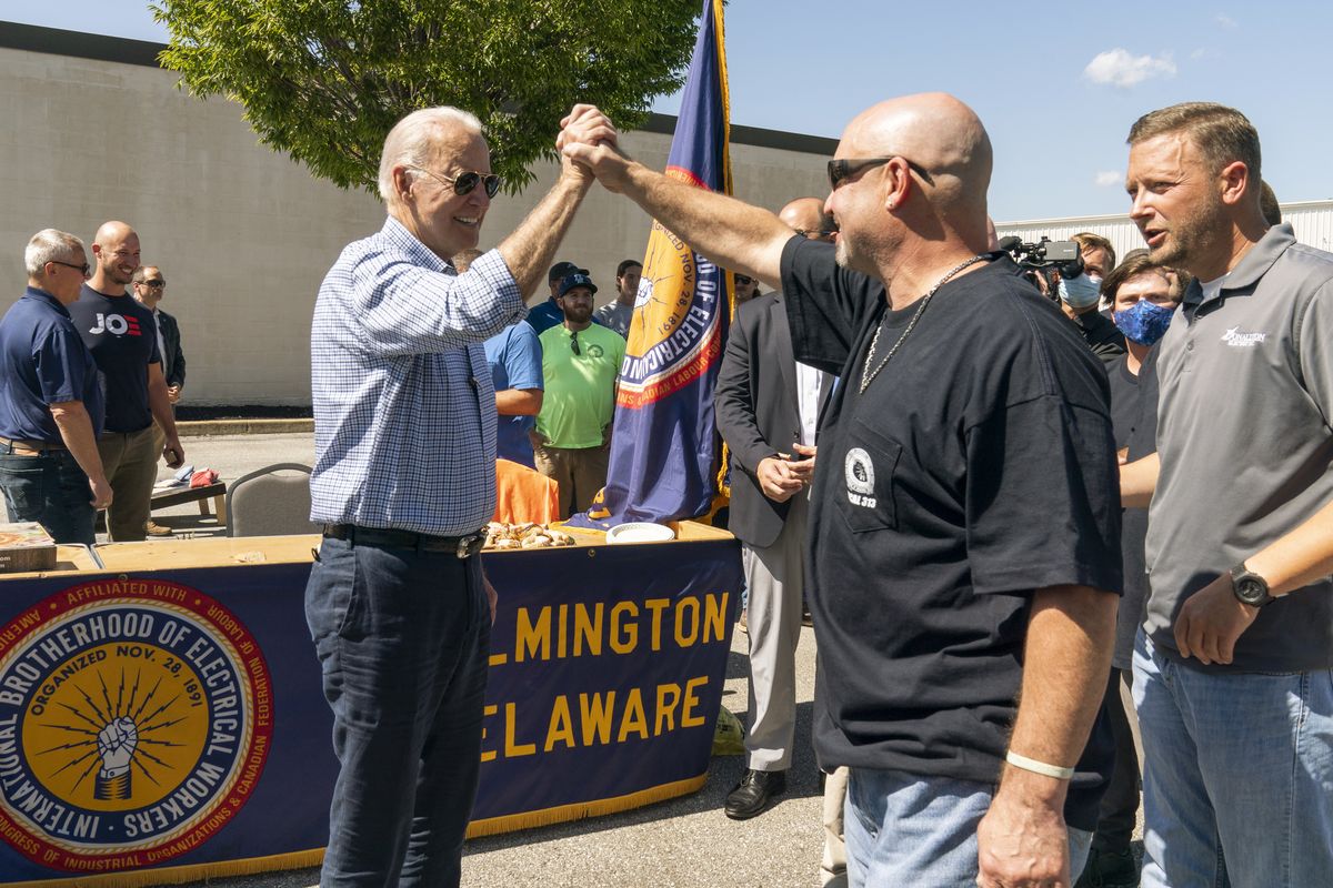 President Joe Biden greets labor union members of the International Brotherhood of Electrical Workers (IBEW) Local 313 in New Castle, Del., commemorating Labor Day, Monday, Sept. 6, 2021. (Manuel Balce Ceneta)