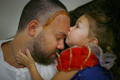 Six years ago, a vaccine designed specifically for musician Kevin Carlberg, shown with his daughter, helped him beat back an aggressive type of brain cancer. Los Angeles Times (Jay L. Clendenin Los Angeles Times / The Spokesman-Review)