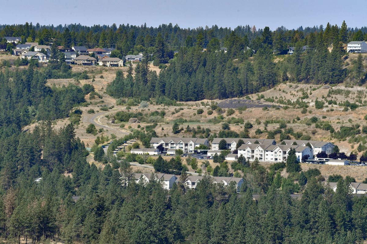 The Canyon Bluff apartments in west Spokane are located in an area that is part of the wildland urban interface.  (Tyler Tjomsland/The Spokesman-Review)