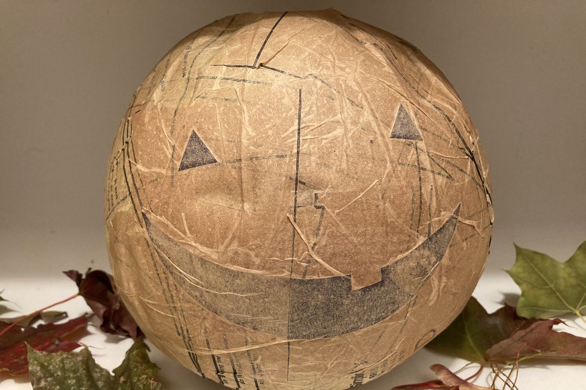 Tissue paper from vintage patterns is the perfect color for papier-mache in the autumn.  (Katie Patterson Larson/For The Spokesman-Review)