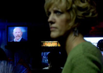 
Cruisers Bar owner Sheri Herberolz watches Steve Groene on the Oprah show at the bar in Stateline on Tuesday. The establishment sponsored a fund-raiser for Shasta Groene in July. 
 (Kathy Plonka / The Spokesman-Review)