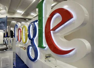 
The Google booth at a convention in San Francisco is shown last week. Google Inc. reported increased earnings for the first quarter, beating analysts' estimates and easing concern about a downturn in the company's revenue stream.
 (The Spokesman-Review)