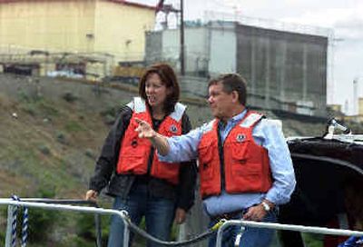 
Sen. Maria Cantwell, D-Wash., and Mike Wilson, Washington state Department of Ecology nuclear waste program manager, discuss the risks of a  plan to leave radioactive waste in leaking tanks on the Hanford Nuclear Reservation. Sen. Maria Cantwell, D-Wash., and Mike Wilson, Washington state Department of Ecology nuclear waste program manager, discuss the risks of a  plan to leave radioactive waste in leaking tanks on the Hanford Nuclear Reservation. 
 (Associated PressAssociated Press / The Spokesman-Review)