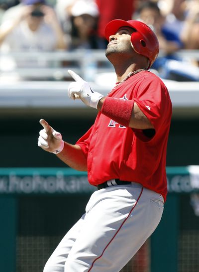 Albert Pujols has arrived in Southern California with the Angels, along with a $240 million contract. (Associated Press)