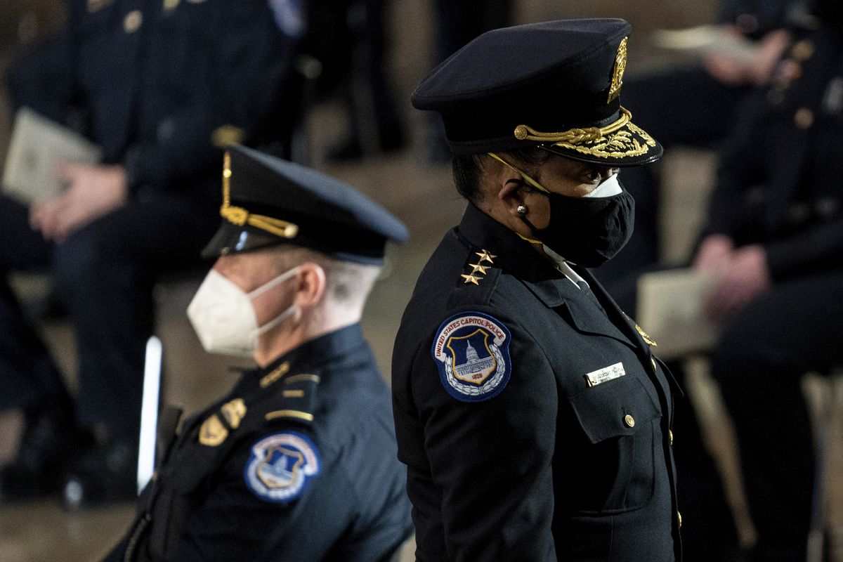 Capitol Police Acting Chief Yogananda Pittman departs a ceremony memorializing U.S. Capitol Police officer Brian Sicknick at the Capitol Rotunda on Feb. 3 in Washington.  (Erin Schaff)