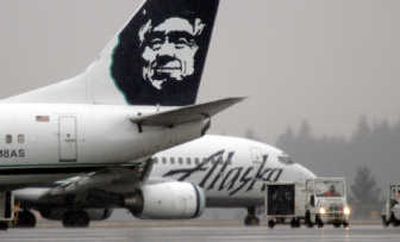 
Alaska Air Group Inc., parent of Alaska Airlines and Horizon Airlines, said Thursday that adjusted earnings resulted in a $17.9 million loss for the fourth quarter.
 (File Associated Press / The Spokesman-Review)