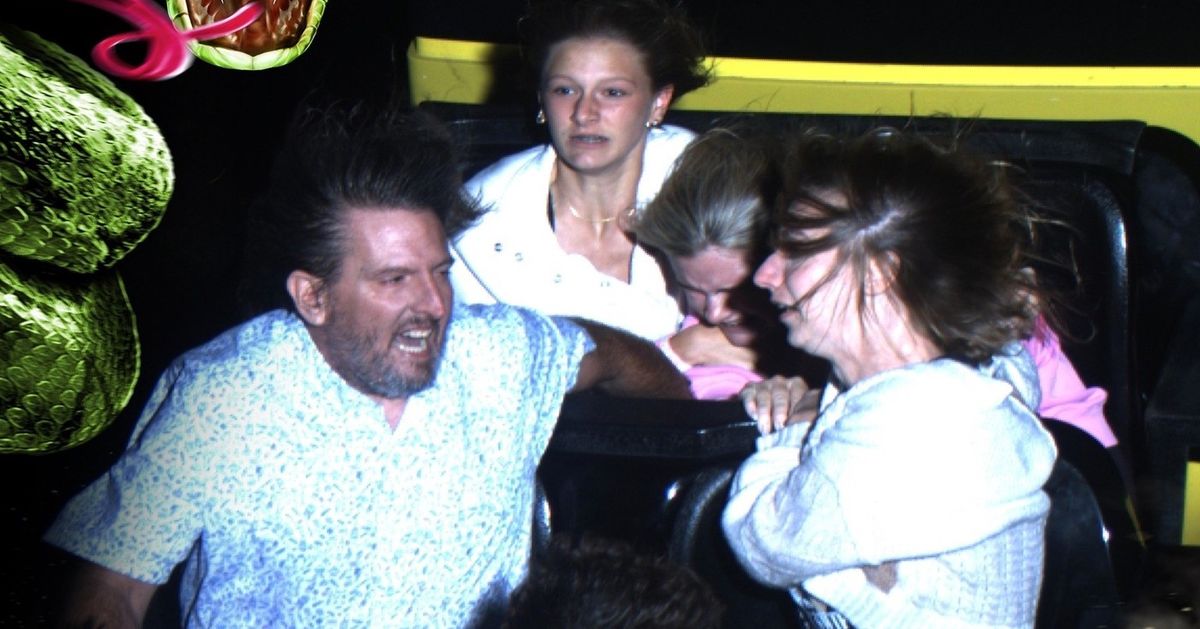Chris Evins, left, and Cassie Evins, right, help a girl whose seat belt came loose during a roller coaster ride on Oct. 11 at Worlds of Fun in Kansas City, Mo.