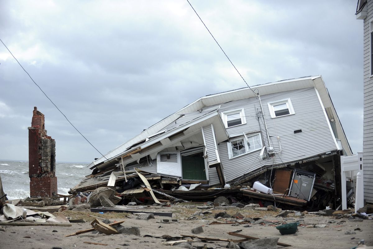 This Oct. 30, 2012 photo shows a house destroyed during Superstorm Sandy on Fairfield Beach Road in Fairfield, Conn.  While Connecticut was spared the destruction seen in New York and New Jersey, many communities along the shoreline, including some of the wealthiest towns in America, were struggling with one of the most severe storms in generations. (Autumn Driscoll / The Connecticut Post)