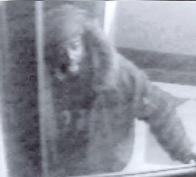 
This image taken from security camera video shows  a mugger who struck a 101-year-old woman in the head  before stealing her purse  March 9 in New York. 
 (Associated Press / The Spokesman-Review)