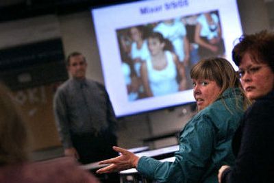 
About 35 parents, administrators and students attended a parent meeting about canceling mixer dances at Central Valley High School on Monday night. School administrators canceled the informal dances because of what they said was students' inappropriate dancing and clothing. Other high schools in the region have also canceled mixers. 
 (Jed Conklin / The Spokesman-Review)