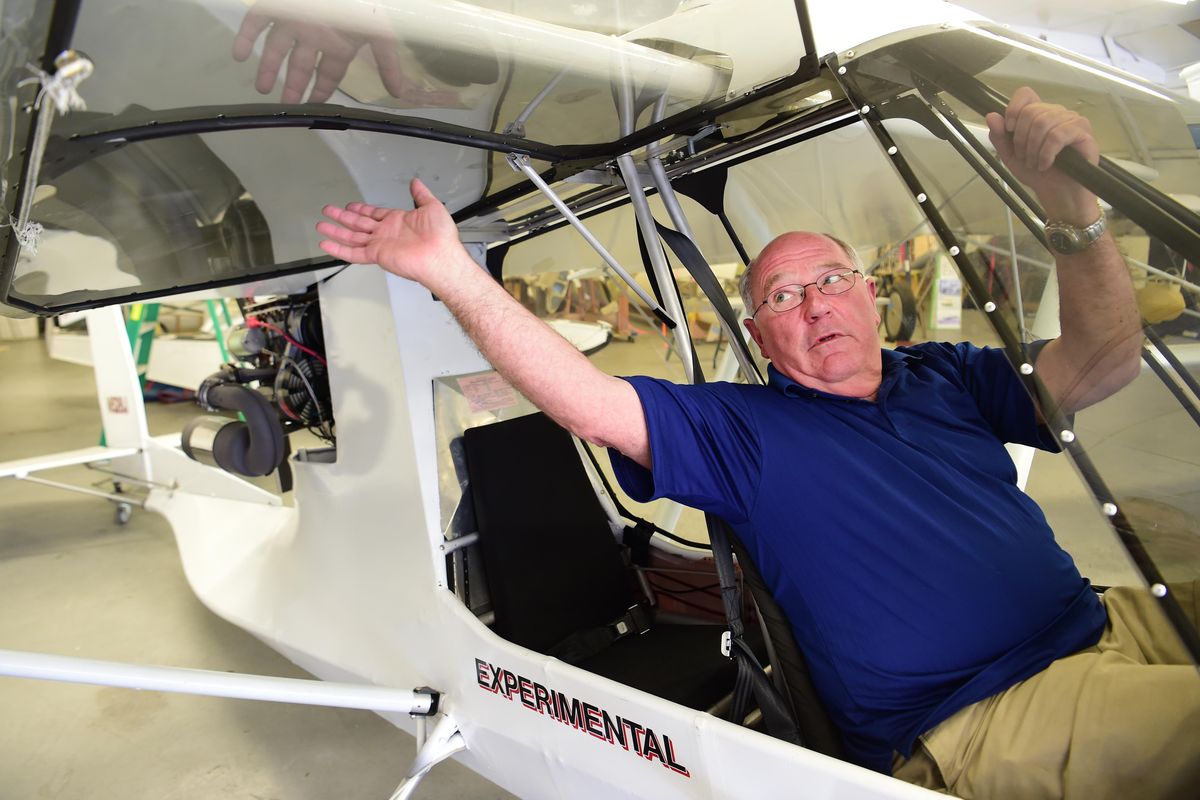 Jim Schindler sits in his recently completed two-seat Challenger II aircraft, Tuesday, July 3, 2018, at the Experimental Aircraft Association hangar at Felts Field in Spokane Washington. Because he only recently completed the plane from a kit, he is still flying only locally until he completes the required number of hours he needs to prove the planes reliability to the FAA. (Jesse Tinsley / The Spokesman-Review)