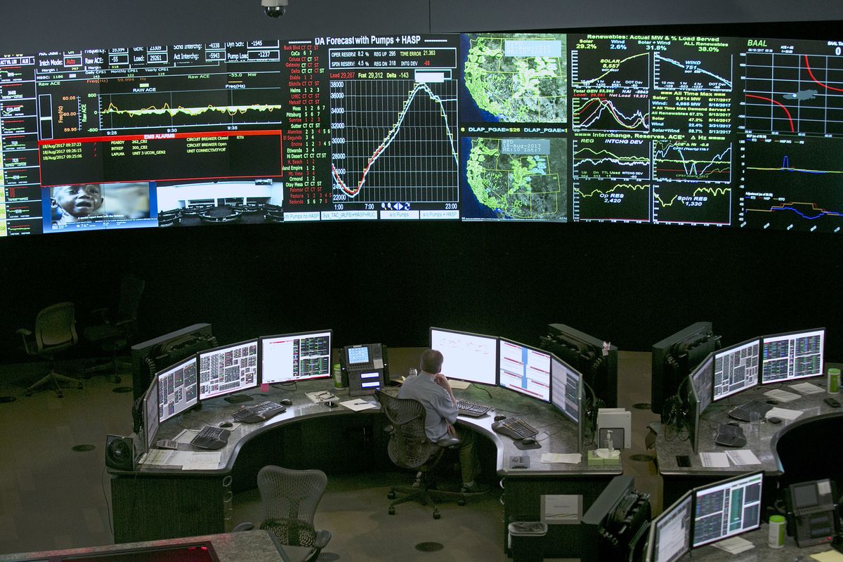 FILE - In this Aug. 18, 2017, file photo, electrical power flow and conditions are monitored at the California Independent System Operator grid control center in Folsom, Calif. California energy leaders on Friday, May 6, 2022 said the state may see an energy shortfall this summer. Officials from the ISO, the California Energy Commission and the California Public Utilities Commission said Californian