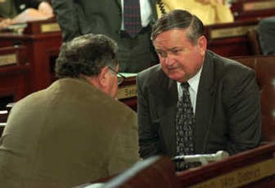 
State Sen. Eugene Prince, right, confers with a colleague  in February 1997.Associated Press
 (File Associated Press / The Spokesman-Review)