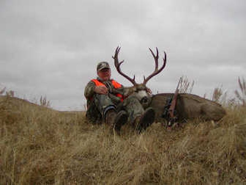 Frank Moran poses with the deer he killed while hunting in Eastern Montana.
 (Associated Press / The Spokesman-Review)