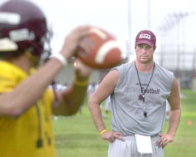 FILE - This Aug. 15, 2006, file photo shows former NFL quarterback Ryan Leaf, quarterbacks coach at West Texas A&M University, setting up to throw the football while working with the offense during practice in Amarillo, Texas. The attorney for former NFL quarterback Ryan Leaf says a plea deal has been reached in his Texas drug and burglary case. Bill Kelly said Thursday, March 25, 2010,  that Leaf has agreed to plead guilty to seven counts of obtaining a controlled substance by fraud and one count of delivery of a simulated controlled substance. (Henry Bargas / Amarillo Globe-news)
