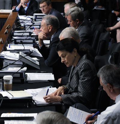 The Senate Finance Committee, including Sen. Olympia Snowe, R-Maine, listen during opening remarks of the markup of health care legislation Tuesday on Capitol Hill in Washington.  (Associated Press / The Spokesman-Review)