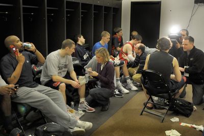 Gonzaga players meet with members of the press for locker-room interviews in the Rose Garden on Friday.  (Christopher Anderson / The Spokesman-Review)