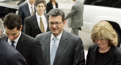 
Joe Nacchio, former head of Qwest Communcations, arrives to be sentenced at the federal courthouse with his wife, Anne, and son Michael in Denver, Colo., on July 27. Associated Press
 (Associated Press / The Spokesman-Review)