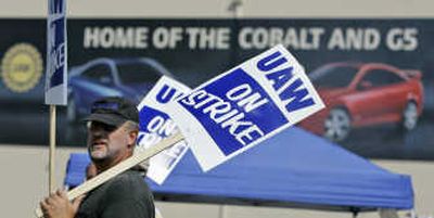 
Bill Haug, 50, stands on strike at the Lordstown General Motors plant Tuesday, in Lordstown, Ohio. Associated Press
 (Associated Press / The Spokesman-Review)