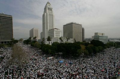 
About 500,000 demonstrators protest proposed immigration legislation around City Hall in Los Angeles on Saturday. 
 (Associated Press / The Spokesman-Review)