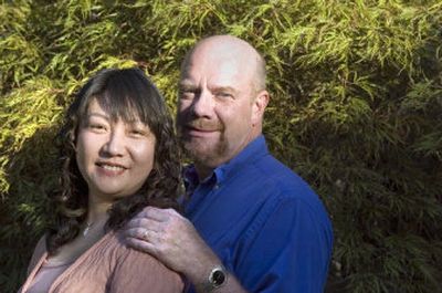 
Marv Hunt met Zhang Miao in China during a business trip. Now married, they live on the South Hill. 
 (CHRISTOPHER ANDERSON / The Spokesman-Review)