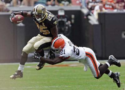 
New Orleans running back Reggie Bush (25) insists he did not accept gifts or money during his career at USC. 
 (Associated Press / The Spokesman-Review)