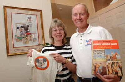 
 Dale and Betsy Nelson show off their Disney memorabilia Tuesday in their home in Orlando, Fla. They left their law enforcement jobs in Fort Lauderdale to move closer to Walt Disney World. Betsy is holding her Mouseketeers T-shirt, which she wore when she was 5 years old. 
 (Associated Press / The Spokesman-Review)