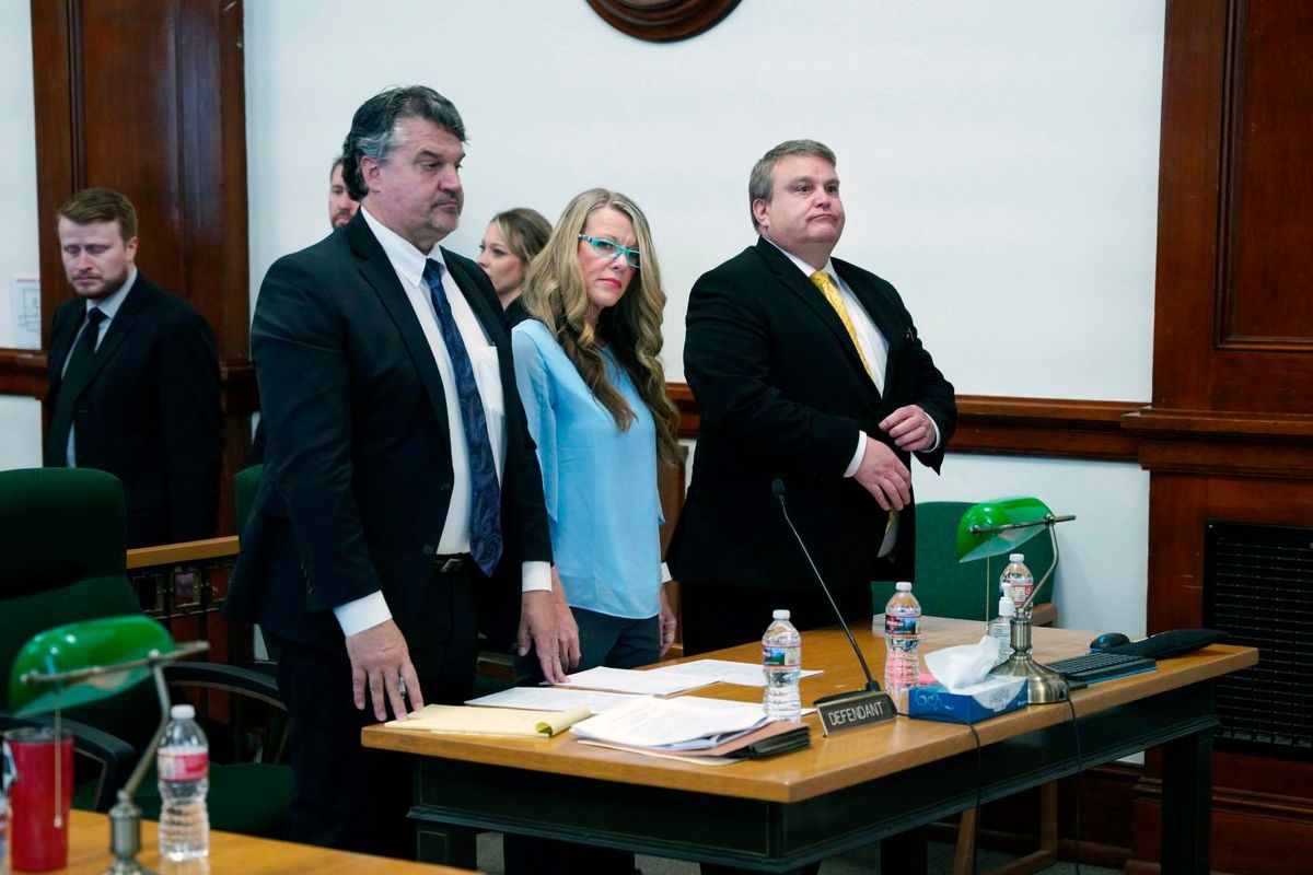 Lori Vallow Daybell, center, listens during a court hearing in St. Anthony, Idaho, Tuesday, April 19, 2022. Daybell, who is charged with conspiring to kill her children, her estranged husband and a lover
