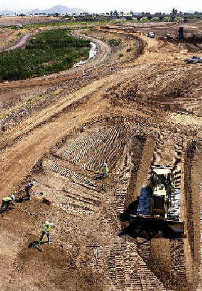 
A section of the Salt River, being rehabilitated by the U.S. Army Corp of Engineers, is shown during April in Phoenix. 
 (Associated Press / The Spokesman-Review)