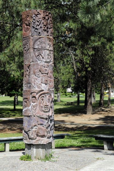 This sculpture stands near Woodside Avenue and Fleming Place in north Spokane, where it honors settlers, missionaries and native people of the region. (Jesse Tinsley / The Spokesman-Review)