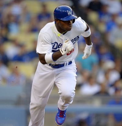 Yasiel Puig went 2 for 4 in his major league debut for the Dodgers. (Associated Press)