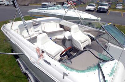 
Boats involved in a Thursday crash on Lake Coeur d'Alene sit at the Kootenai County Sheriff's Marine Division building for inspection. 
 (Jesse Tinsley / The Spokesman-Review)