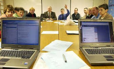 At a meeting at the Kellogg School District office Thursday, school administrators listen as district technology guru Steve Knox, not shown, tells them what it will take to salvage the district's information database after the Albertson Foundation pulled its financial support for the Idaho Student Information Management System.
(Jesse Tinsley / The Spokesman-Review)
