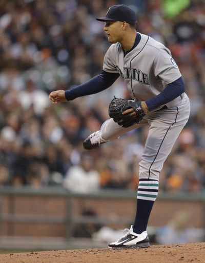 Seattle Mariners pitcher Taijuan Walker watches a pitch to the San Francisco Giants during the first inning of a baseball game Monday, June 15, 2015, in San Francisco. (Associated Press)